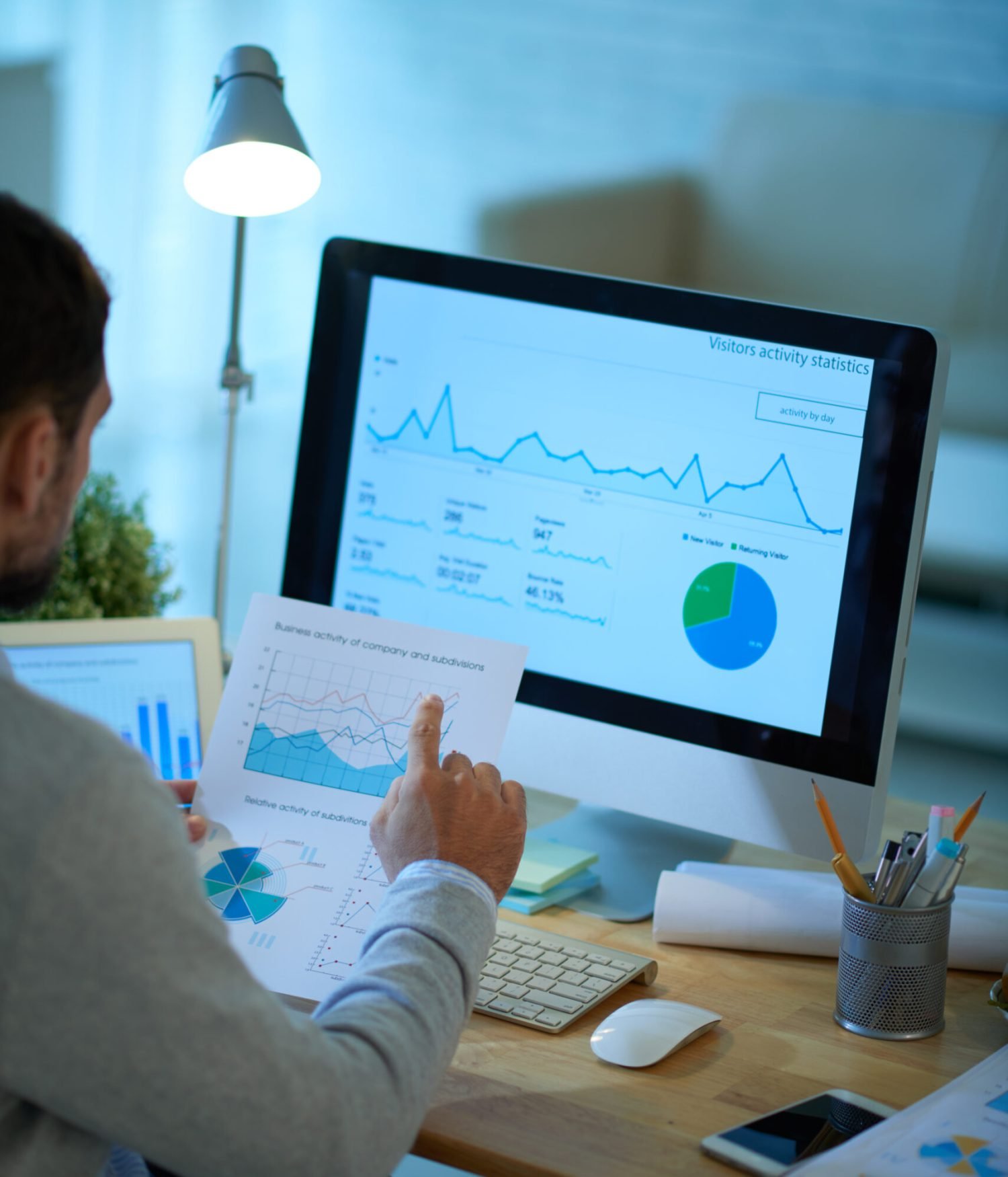Businessman working with financial charts and graphs